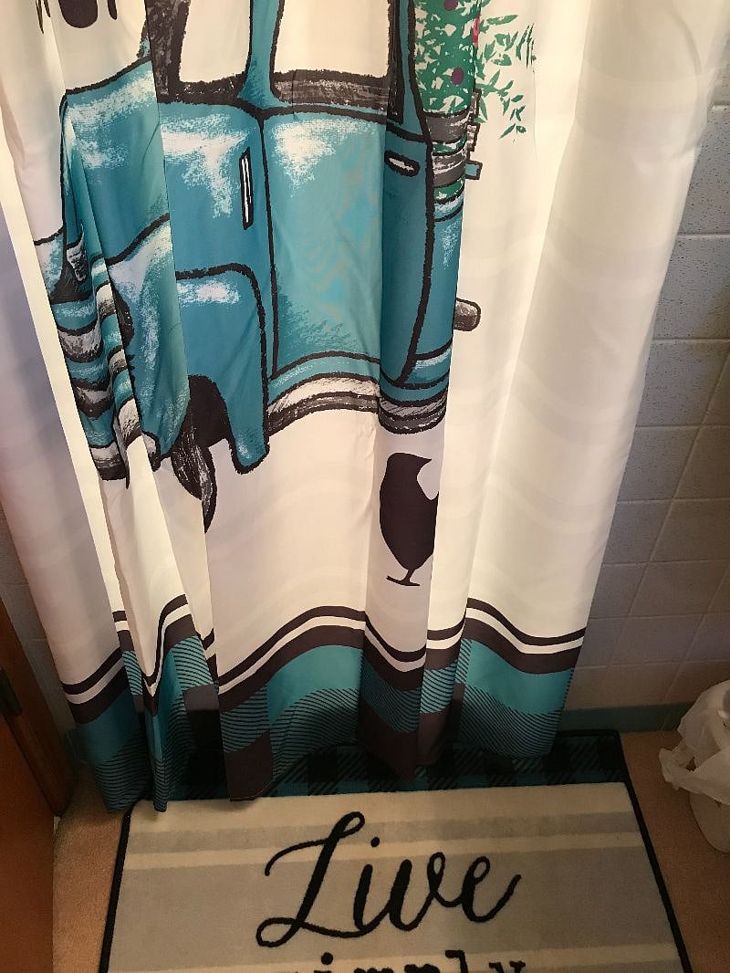 Entrance to full bath with shower adjoining Master Bedroom
