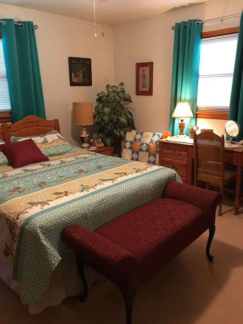 #1-Master bedroom with Queen Size Bed. Desk, Black out Draper. Adjoining Bath with shower. 
