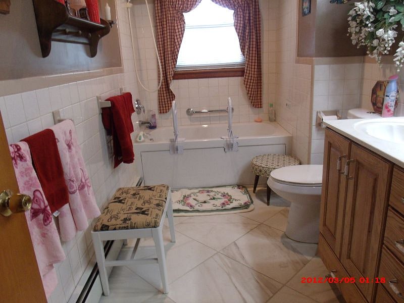 Full Hall bath with Tub and double sink!