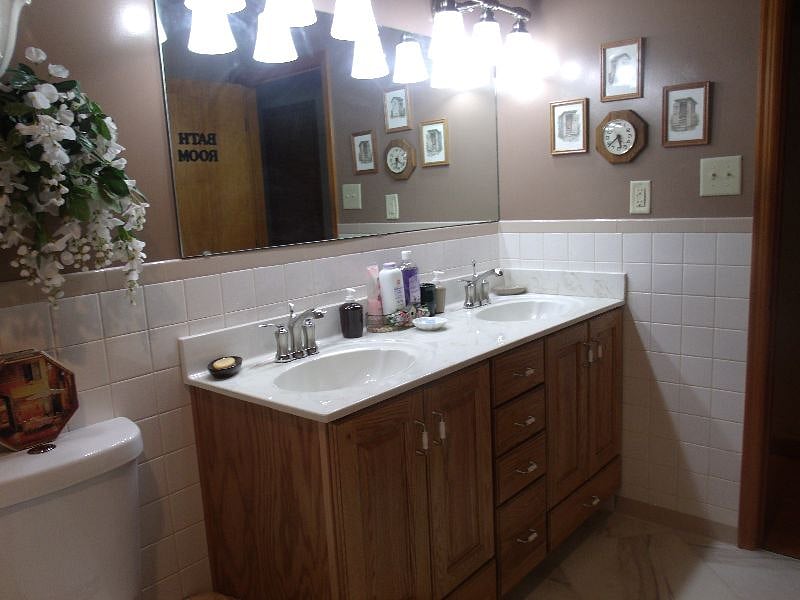 Hall Bath with double sinks and tub. 