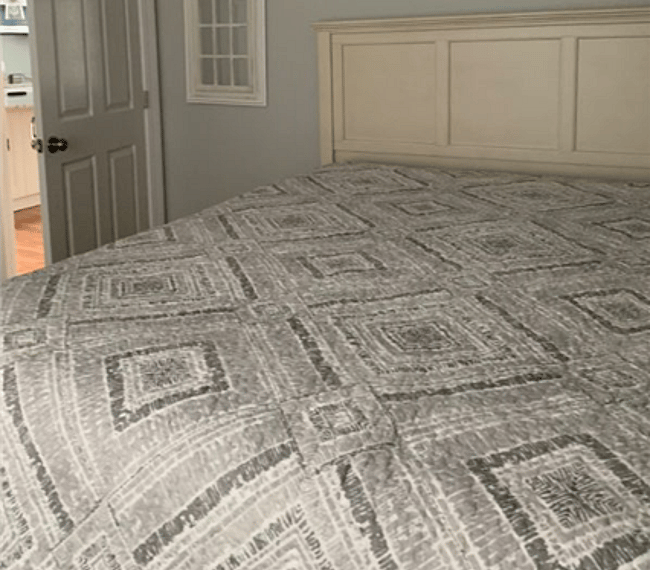 Bedroom with Ceiling Fan and Window