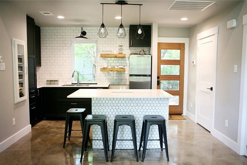 The kitchen is loaded with 20 spices, healthy cooking oils & just about every possible utensil & appliance you could need!
The door on the right is the laundry room & "mud room".