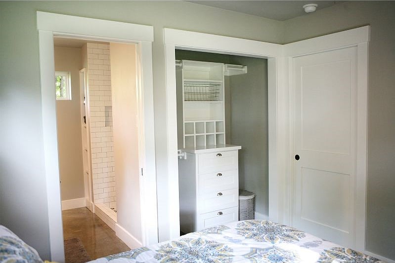 Both bedrooms' closets are designed to maximize space. Both bathrooms & bedrooms have a pocket door that locks from the inside for your privacy.
This bedroom includes a king bed & the bathroom with a double vanity & standup shower.