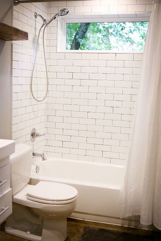 This bathroom is a part of the bedroom that includes a full-sized bed and twin trundle.