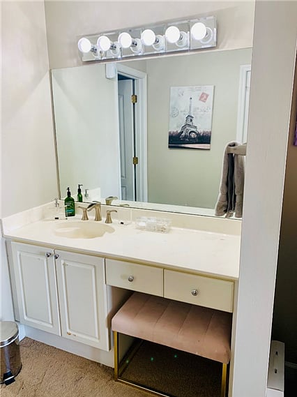Powder room connecting to the bedroom.