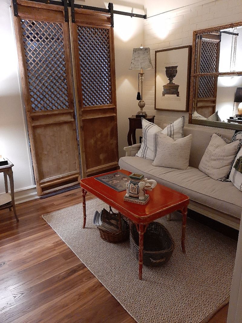 antique doors to extra large closet with larger bedroom