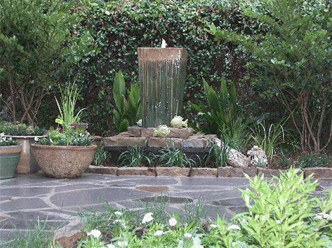 Garden fountain in cool New Orleans private courtyard