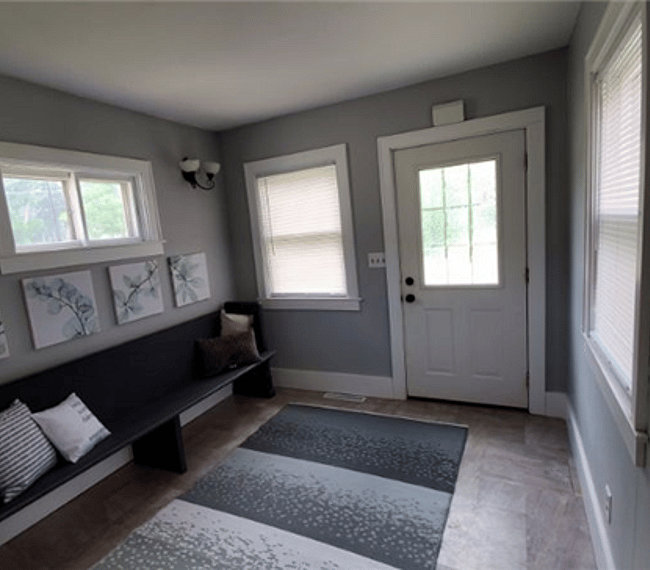 Gorgeous east nook is a favorite spot for morning coffee.  This is view looking back towards the front door.