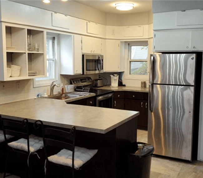 This kitchen is shared with the other two travelers in the home. We have all the basic tools you need to prepare meals and snacks here. You will have a mini fridge in your private room. 