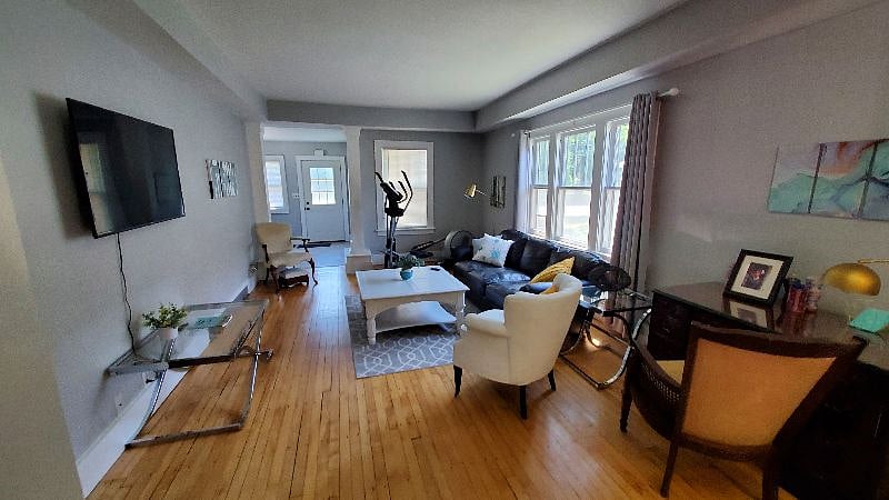 Here's the view of the living area from the kitchen. There is a smart TV provided for your use with the popular apps where you can login to your own personal accounts.