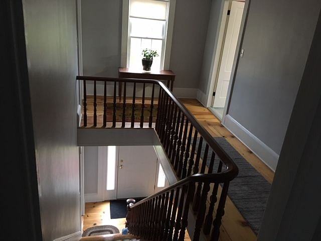 Upstairs central hallway; mahogany staircase
