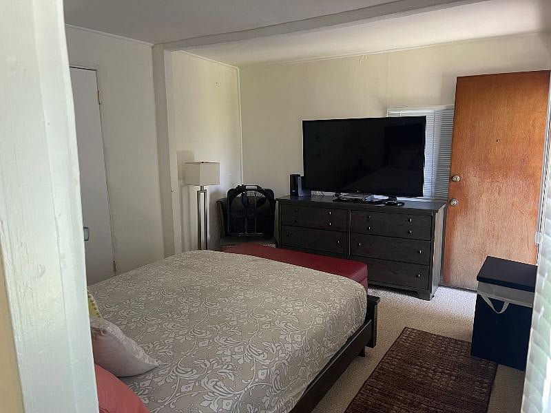Back bedroom, queen bed. Separate, private entrance.