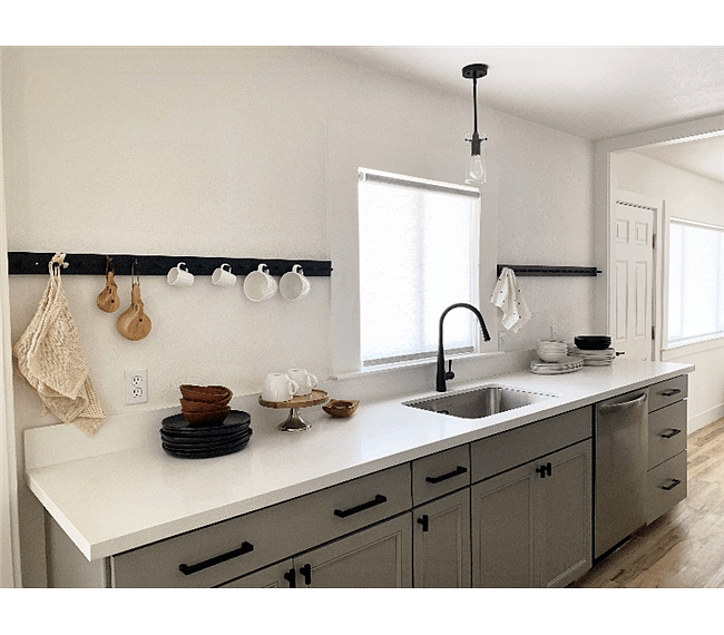 Head to the market for fresh goodies and make a gourmet meal in the fully stocked Scandi-fornian modern kitchen with custom Shaker peg rails.