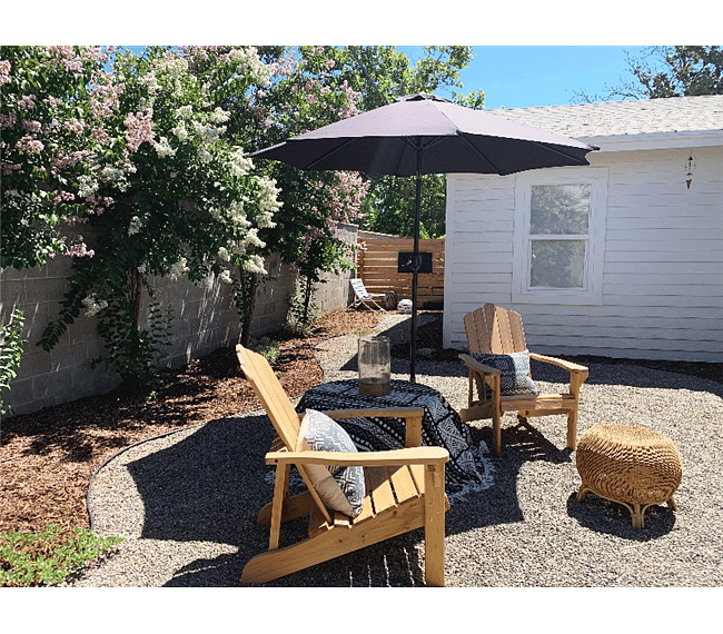 Relax amongst the blooming myrtles in the private backyard. Enjoy a solo moment in the quiet succulent zen garden corner. 