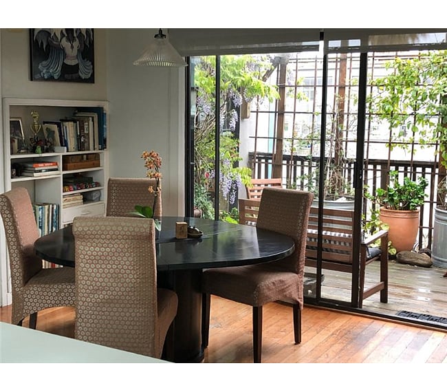 This is the dining area of our kitchen/dining/living room space. The Scandinavian Designs dining table can be sized down for more space or expanded to easily fit 8 people
