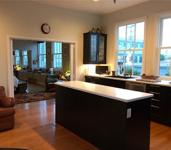 Wide pocket doors lead from the kitchen into the bedroom. They can be closed for privacy
