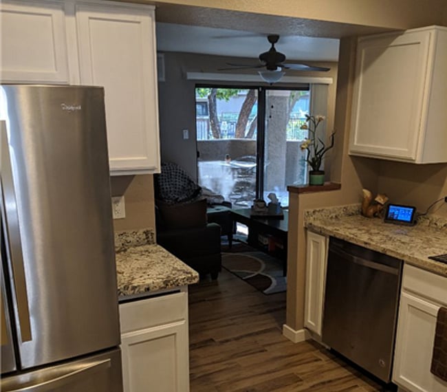 Entry from garage-stackable washer/dryer in unit to the left of garage entrance