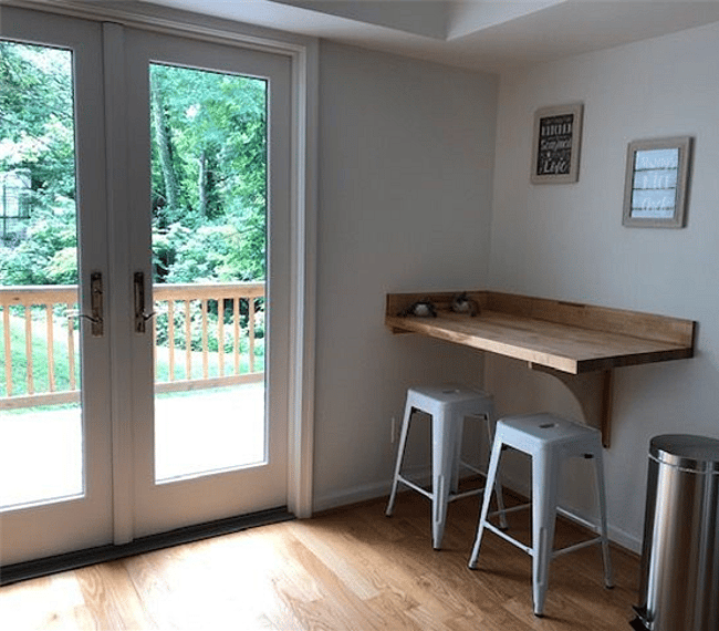 lovely view of deck, butcher block counter in kitchen