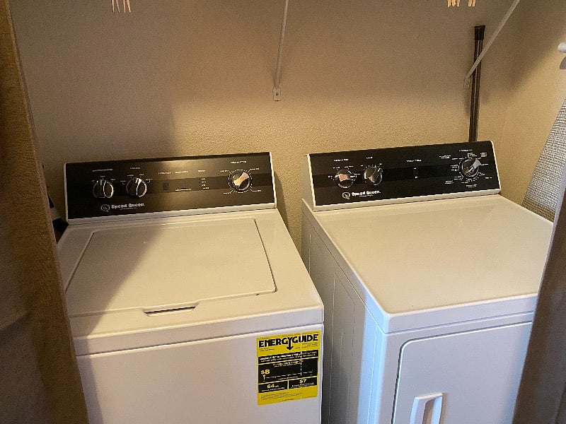 Speed Queen washer/dryer in hallway