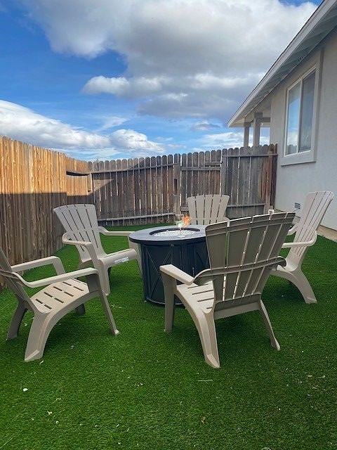 Backyard Gas Fire Pit and Chairs