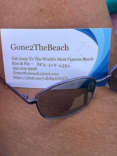 business card taped inside condo