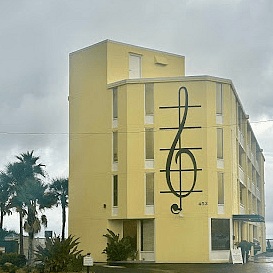 Font of Symphony Beach Club building