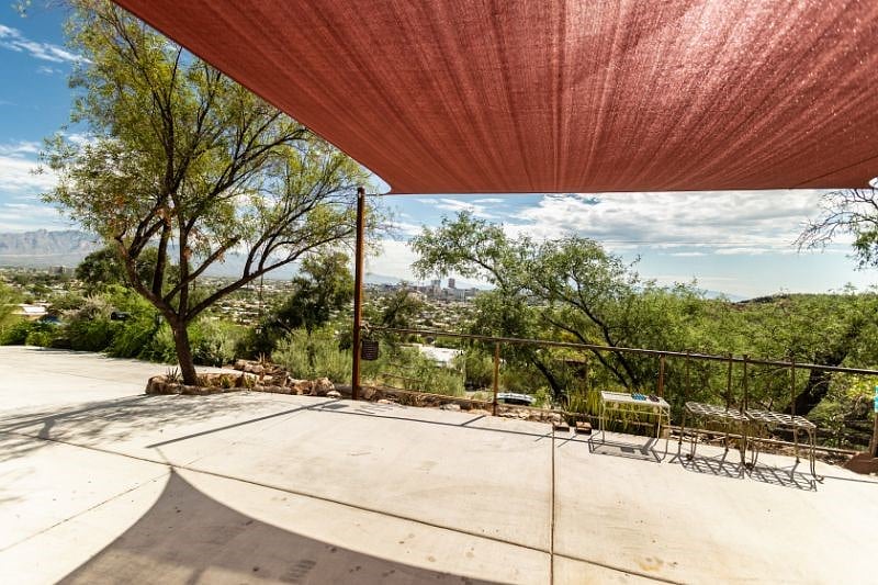 Enjoy the city view from your shaded patio parking. 