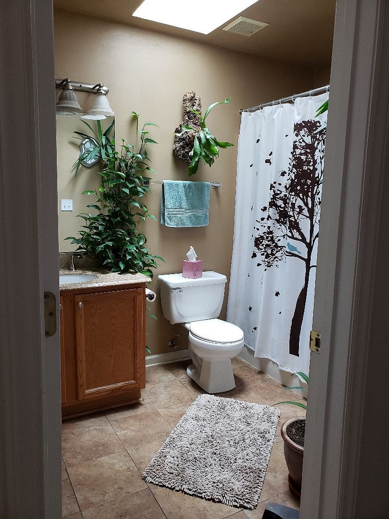 This is the bathroom you will share with one other tenant. It's the brightest room in the house. Thanks to the sky light, you can sit on the toilet and gaze at the stars.... lol