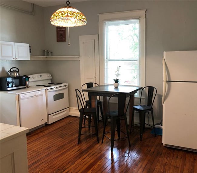 Kitchen and table to eat at