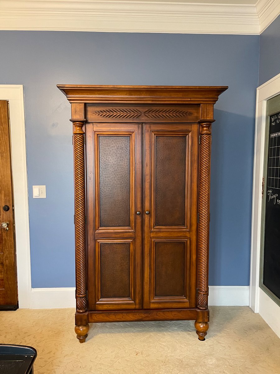 Armoire for hanging clothes and storage.  