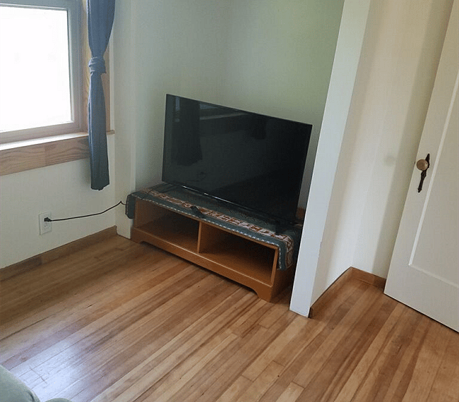 TV with fire stick in sittying room off kitchen