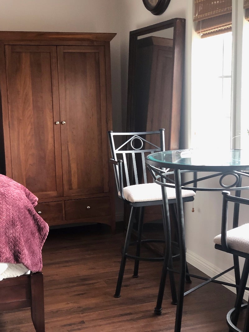 Closet and dining table with two chairs 