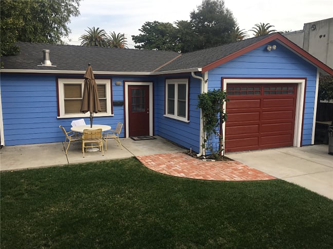 Front of cottage and patio