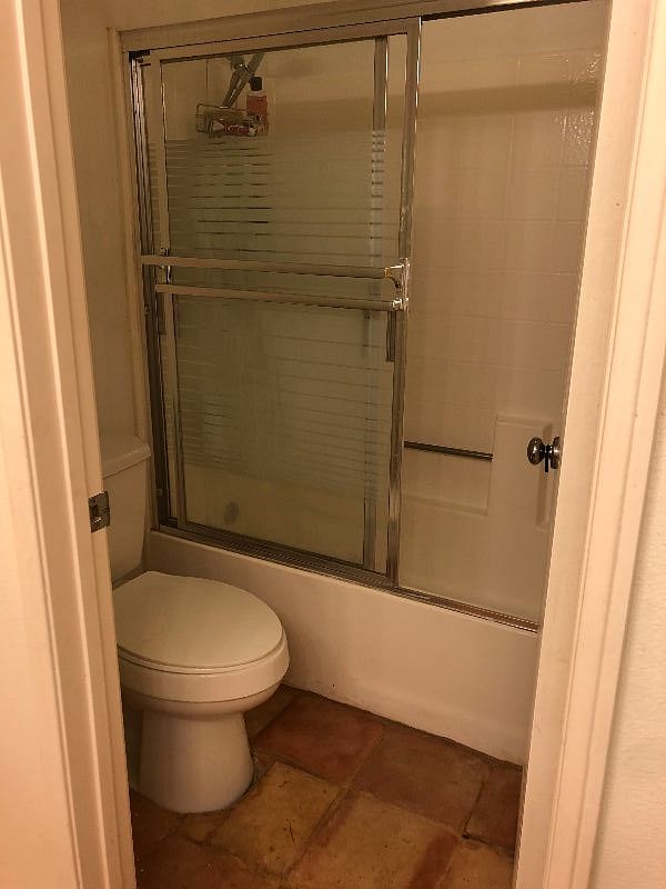 Interior Cozy Condo bathroom - bathtub with shower