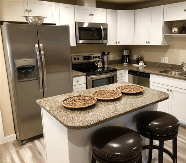 Fully stocked kitchen will island seating
