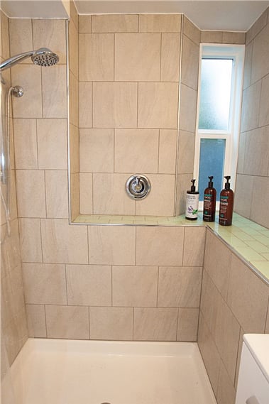 Spa-like shower with quiet ceiling fan