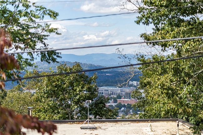 City Views below from the Deck and each Becroom / Living Room
