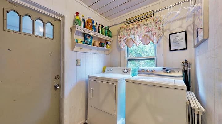 Laundry room access at back hall of apartment. Shared with one other apartment.