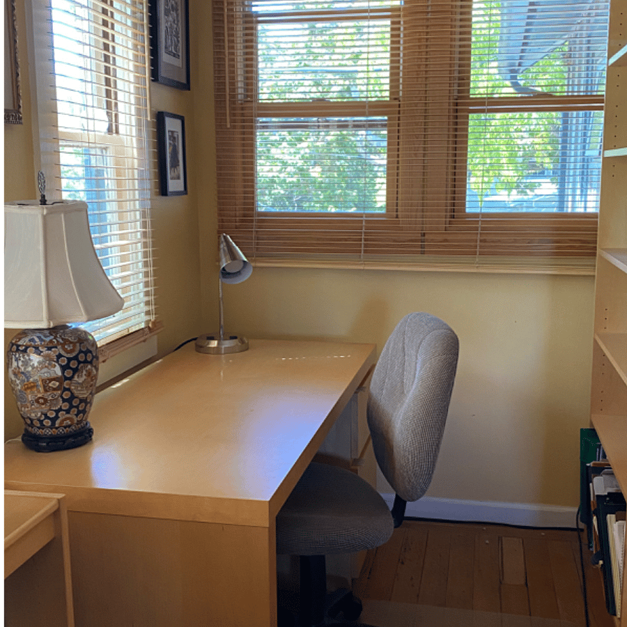 Desk space off living room, well lite. with 2 deck drawer and 2 largee book shelves