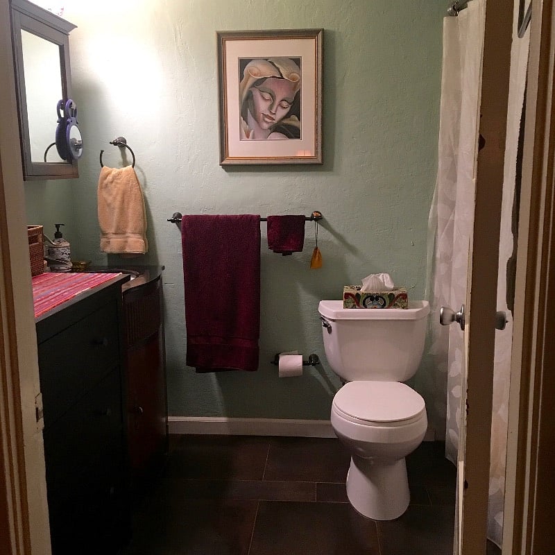 bathroom with shower and bathtub