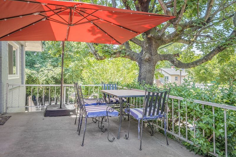 Front Porch with Lighted Umbrella