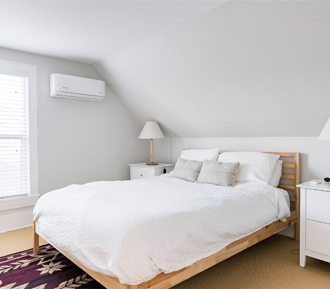 Queen size bed with linens