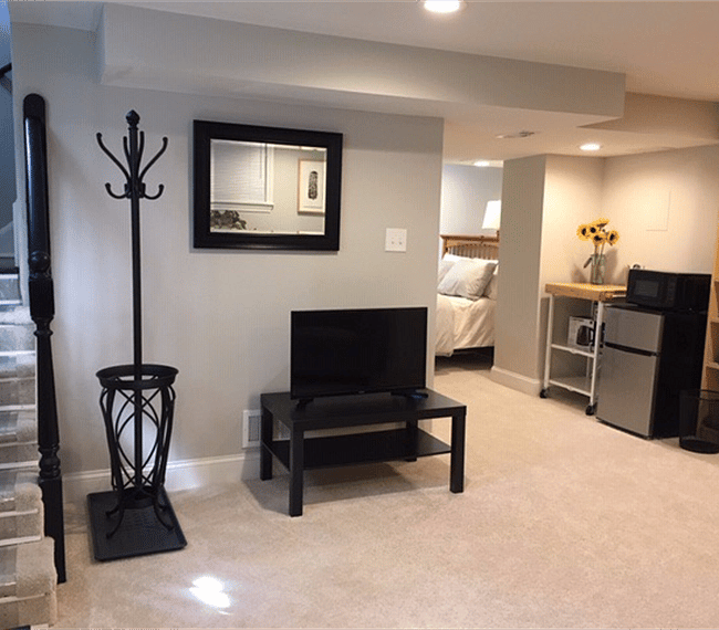 Entrance, living area, and kitchenette. Update - space now includes a 53" LG smart television.