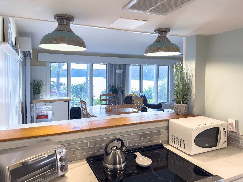 New stove with views of the water and breakfast bar!