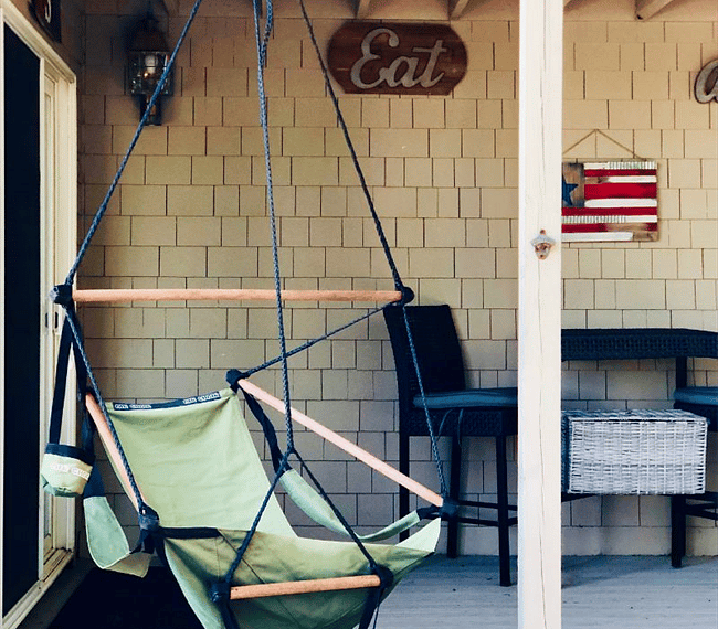 backyard deck with porch swing