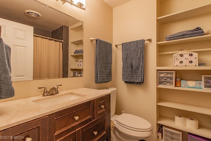 Downstairs: your private bath with tub, shower and ample storage