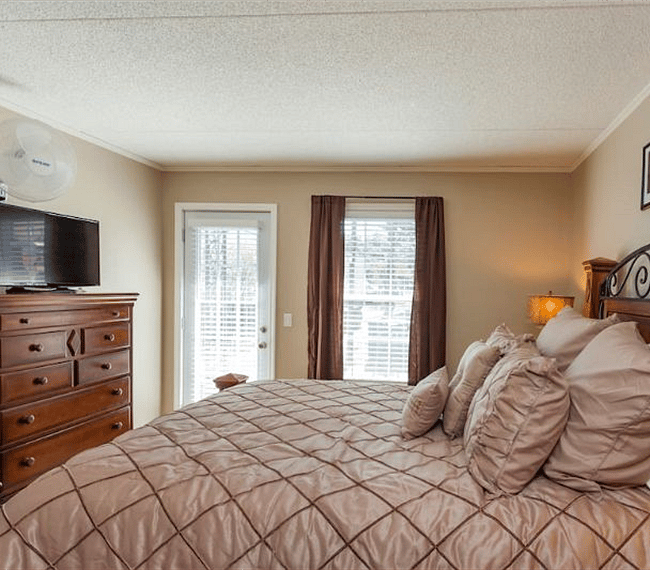 Master bedroom with balcony access