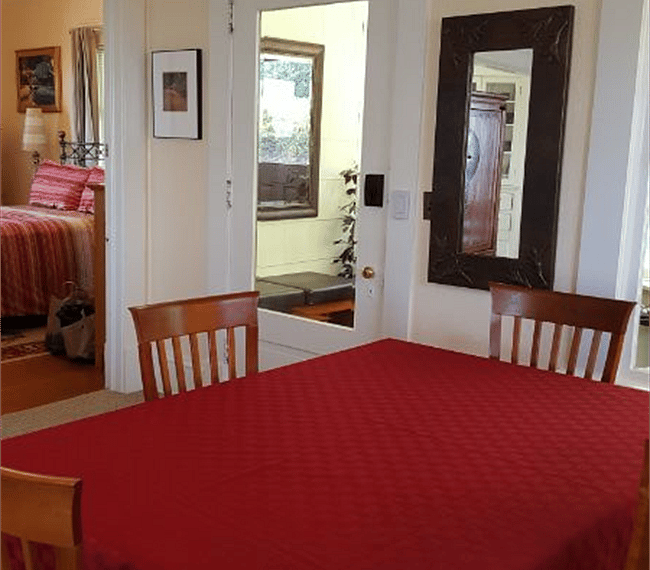 Dining room looking back to front door,