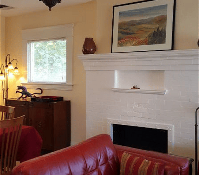 From kitchen looking to fireplace.