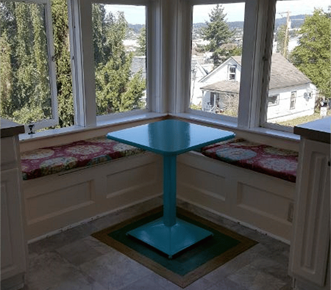Kitchen, bay windows looking onto the city and bay.
